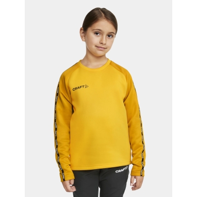 Craft Sportowa koszulka z długim rękawem Squad 2.0 Crew Neck (z recyklingowanego poliestru, optymalna swoboda ruchów) żółta dziecięca