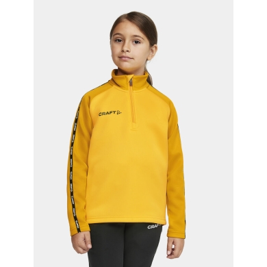 Craft Sportowa koszulka z długim rękawem Squad 2.0 Halfzip (ergonomiczny design, wysoka elastyczność) żółta/złota dziecięca