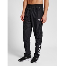 hummel Spodnie sportowe hmlCORE XK Poly Pants (materiał poliestrowy, z kieszeniami na zamek błyskawiczny) Długie czarne Mężczyźni