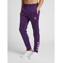 hummel Spodnie sportowe hmlCORE XK Poly Pants (Materiał poliestrowy, z kieszeniami na zamek błyskawiczny) Długie fioletowe Mężczyźni