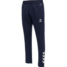 hummel Spodenki sportowe hmlCORE XK Poly Pants (Materiał poliestrowy, z kieszeniami na zamek błyskawiczny) Długie granatowe męskie