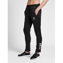 hummel Spodnie sportowe hmlCORE XK Poly Pants (materiał poliestrowy, z kieszeniami na zamek błyskawiczny) długie czarne damskie